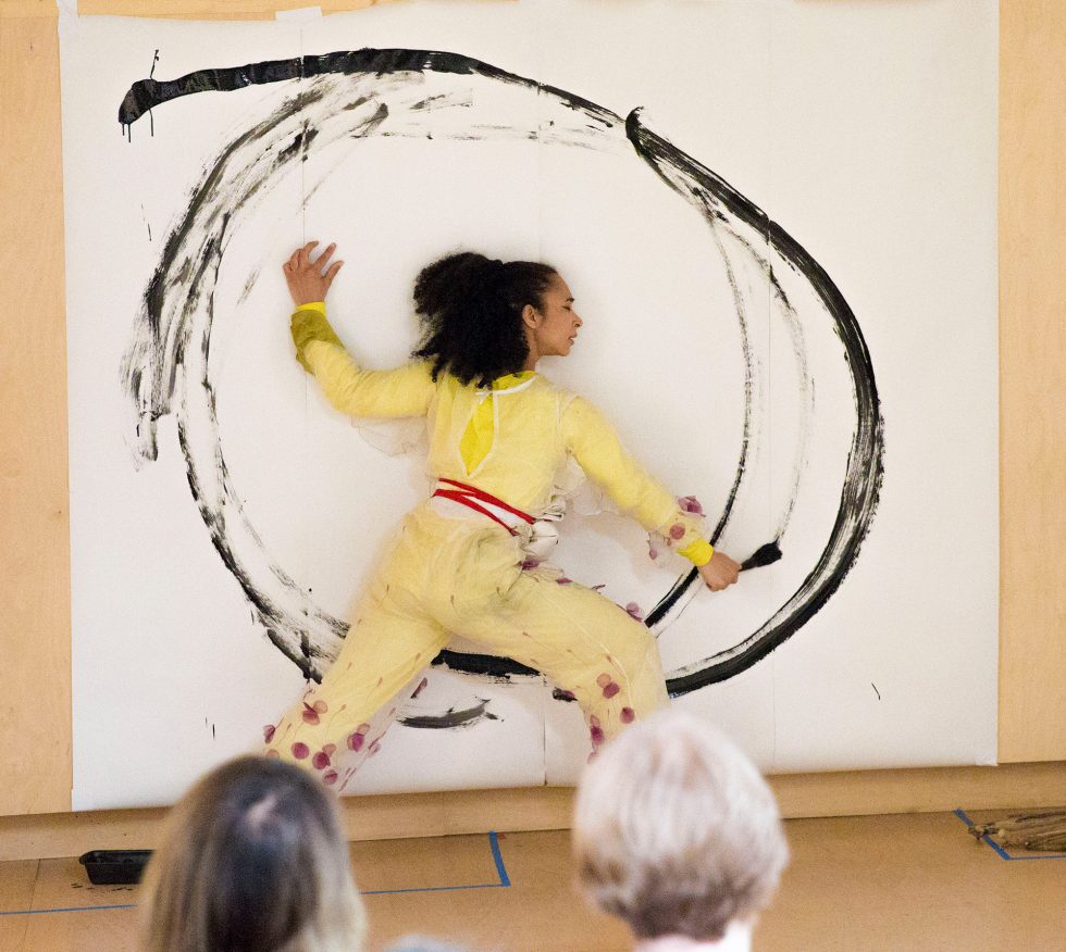 Performer painting at Fertility Fest